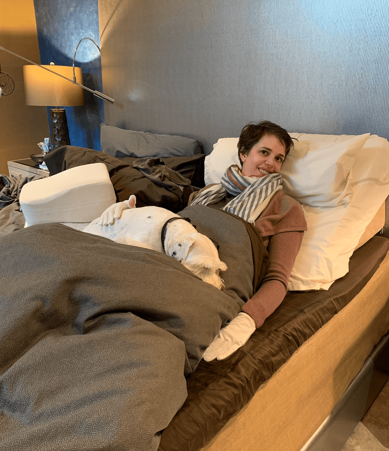 Brooks Bell in white gloves to help with neuropathy